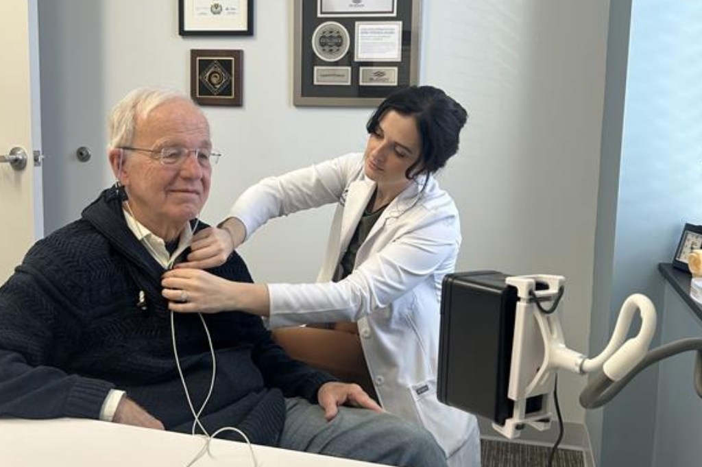 Olivia Patterson working with patient
